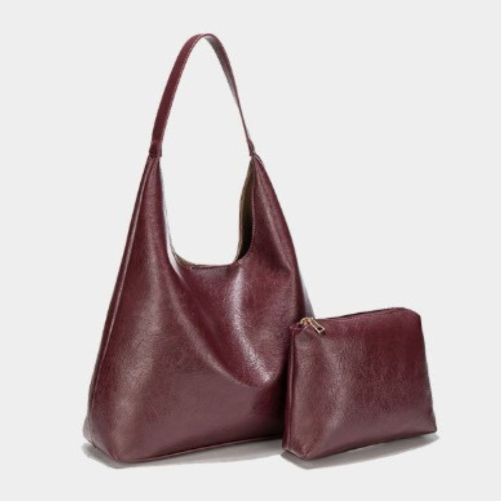 Halbrunde Umhängetasche aus Kunstleder im Vintage-Stil