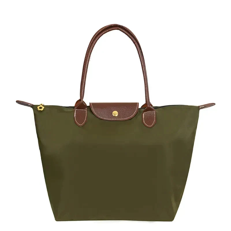 Elegante Damen Umhängetasche mit Schulterriemen und goldfarbenen Details