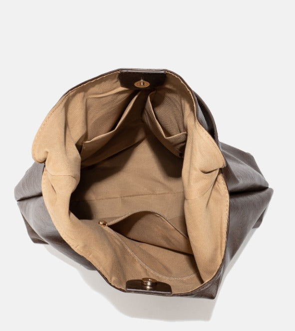 Halbrunde Umhängetasche aus Kunstleder im Vintage-Stil