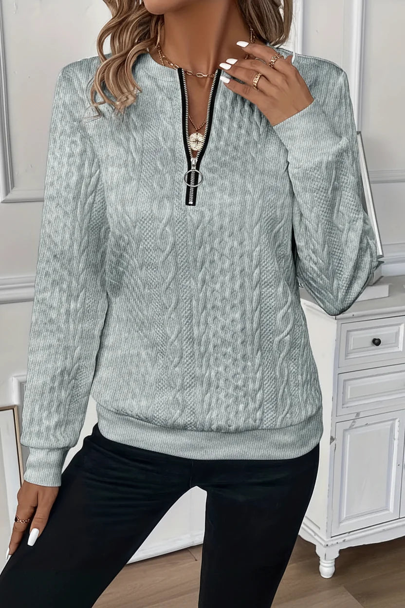 Pull en maille à demi-zip avec tirette anneau
